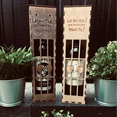 Your Friends Won't Stop Talking About This Wine Box  LET ME OUT!  This is exactly what this wine box design screams. A humorous way of looking classy while looking cool. If you are a person of great wine test then this product is for you. It keeps your bottle well protected and removes the risk of damage if it falls.  Laser-cut and engraved wooden wine box Comes in a light and a dark stain Perfect gift for friends at a party or a home bar Protects your wine bottles