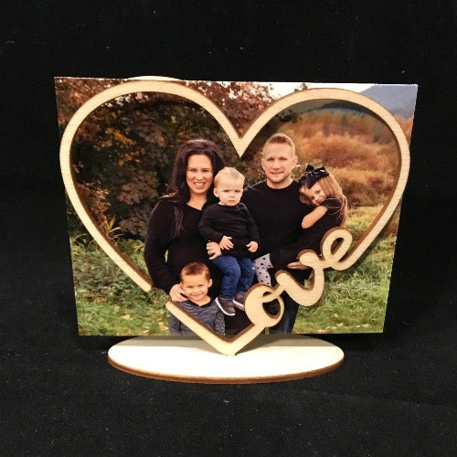 love frame  Frame Shaped For Every Picture  Make the most of everyday with a custom frame suitable for any picture  If you are truly a family person or you need a gift for someone you love then why not pick this beautiful love from up.  Laser-cut frame to your liking Fits every photo 4.5” x 5” Love frame Picture slides in easily